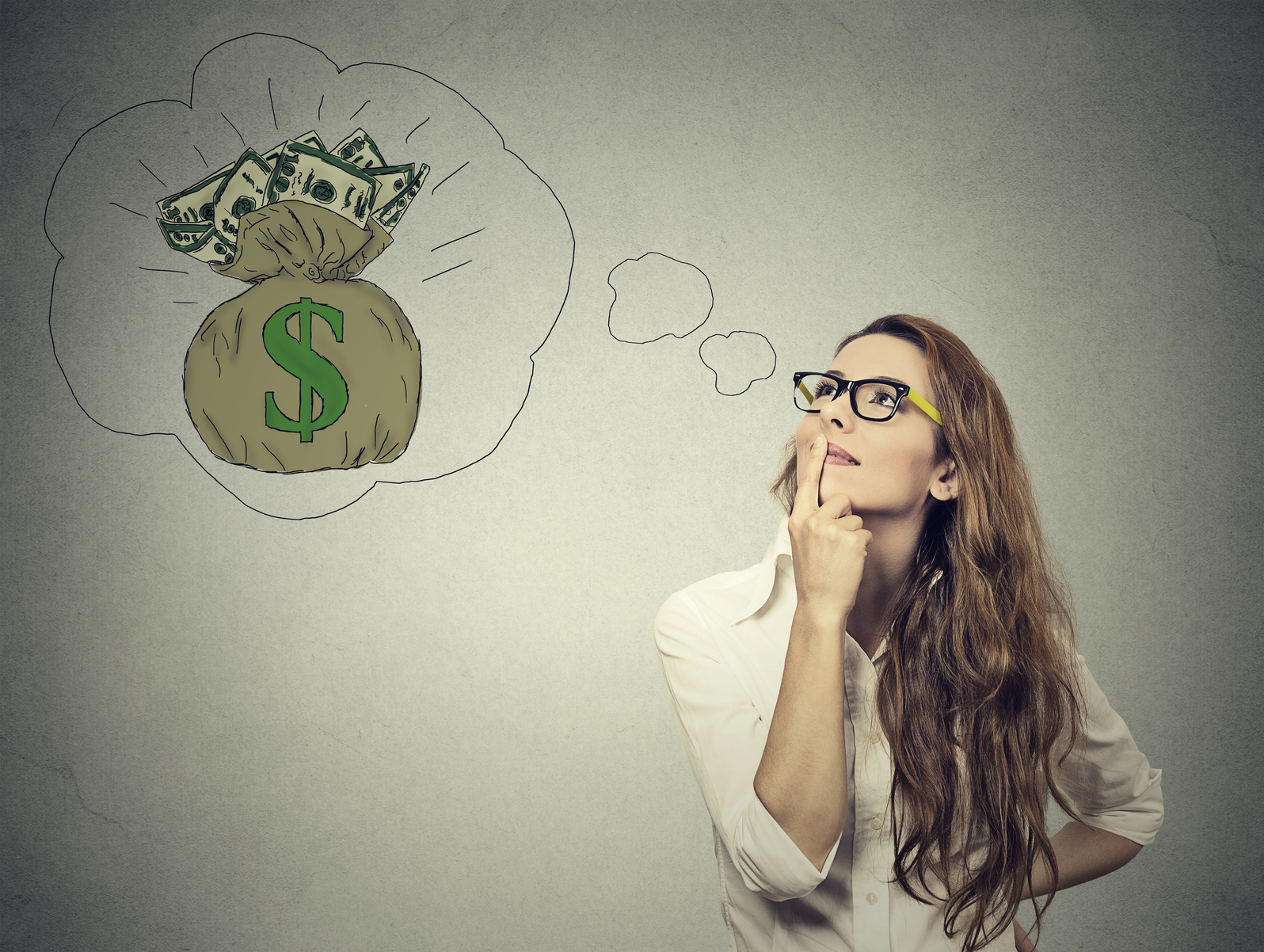 Woman dreaming of financial success